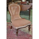 A Victorian mahogany spoon back nursing chair, c.