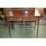 A 19th century mahogany side table fitted with two drawers to frieze, brass drum handles,