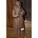 A figure of St Leopold Mandic by Elizabeth Koster