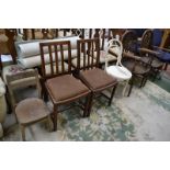 A Thonet bentwood chair (original paper label to underside); two wheelback carved dining chairs;