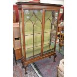 A Sheraton revival mahogany display cabinet cyma recta cornice with Greek key fretwork,