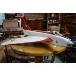 A Balsa wood model of an Electric Lightning jet plane.