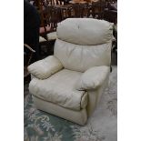 A cream leather recliner armchair