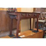 A hardwood Chinese altar table, crossbanded top, raised shaped apron shaped ends,