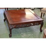 An Oriental hardwood coffee table