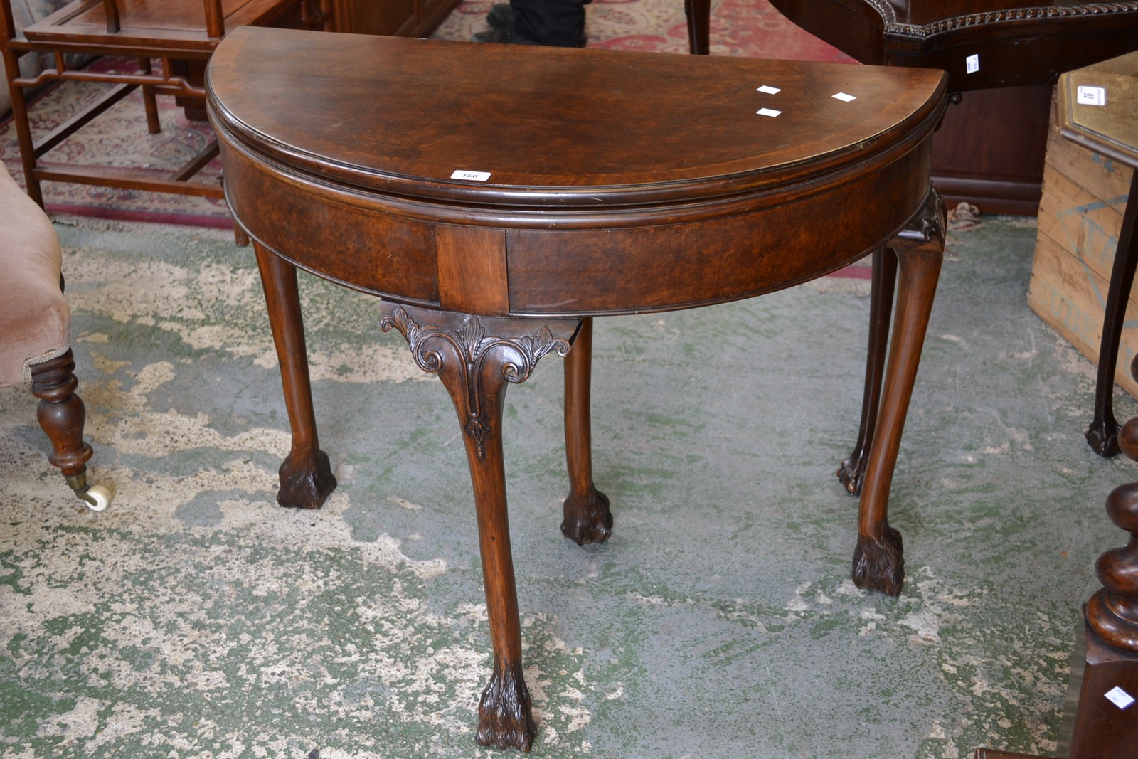 A mahogany and walnut demi lune card table c.1900, Henry Stone & Sons, Banbury.