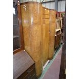 An Art Deco maple double wardrobe, by Berick Furniture, c.