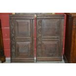 Two oak panels with carved lunette decoration over fielded panels.