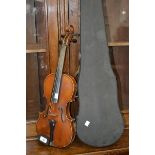 A violin, Stradivarius label, back 35.