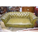 An early 20th century leather Chesterfield sofa