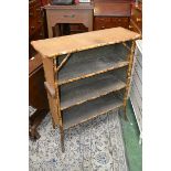 A bamboo three shelf bookcase