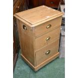 A small pine three drawer chest of drawers