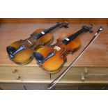 A mid 20th century Berini 3/4 size violin cased with bow en-suite,