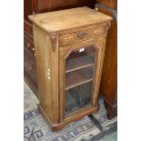 An Edwardian inlaid walnut music cabinet, canted angles, single drawer over glazed cupboard.