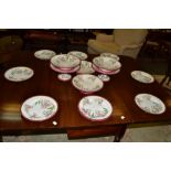 A Minton hand painted dessert set, two large comports, four smaller, and twelve plates,