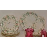 A set of ten Royal Crown Derby side plates and a similar serving plate,