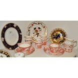 A Royal Crown Derby Red Aves teacup and saucer;  Rougemont cream jug;  Red Aves cream jug;