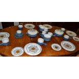 A Denby ' Chatsworth' part dinner service, the plates with large blue flowers,