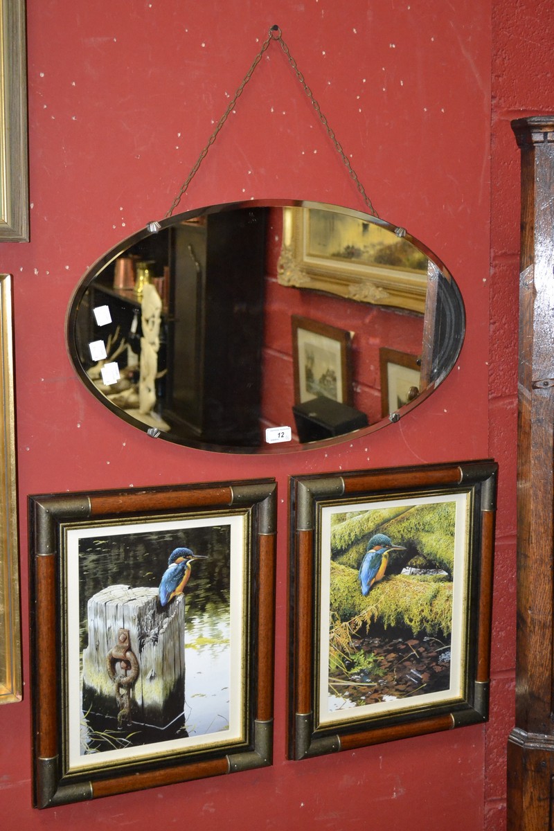 A 1940's oval bevel edged wall mirror; two Kingfisher prints, framed.