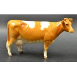 A Beswick Guernsey cow