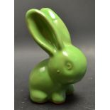 A Denby cotton tail rabbit, glazed in green,  12cm, printed marks in black (faults) Condition
