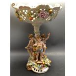 A Dresden figural comport/table centre with pierced basket bowl