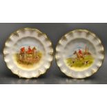 A pair of Royal Crown Derby wavy edged fox hunting plates