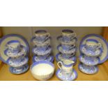 A late Victorian Staffordshire tea set printed in blue and white Willow pattern, c.