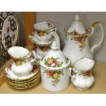 A Royal Albert Old Country Roses pattern coffee pot, biscuit barrel, cream jugs, cups,