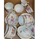 A Royal Crown Derby posie pattern bachelor's tea pot, milk and sugar, two tea cups and saucers,