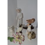 Decorative Ceramics - a Nao figure of a Girl; a Beswick model of a white cat; a Beswick Siamese cat;