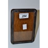 An early twentieth century rounded rectangular easel photograph frame ,