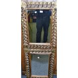 A pair of  gilt framed rectangular mirrors,