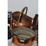 A copper helmet shaped coal scuttle';