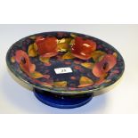 A Moorcroft Pomegranate pattern footed bowl (faults)