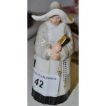 A Royal Worcester candle snuffer The Nun (faults)