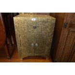 A brass effect bedside cabinet,