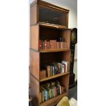 An oak Globe Wernike bookcase,