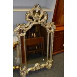 A classical style wall hanging mirror,