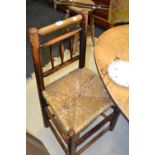 A North Country rush seated spindle back chair