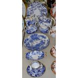 A Royal Crown Derby Mikado pattern three piece tea set;  a shaped butter bell;  plates etc ;