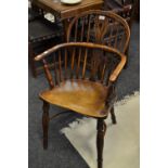 A yew and elm low hooped back Windsor chair,