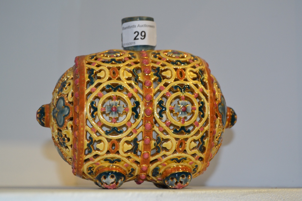 A Zolnay Pecs style reticulated barrel,