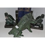 A pair of verdigris, bronzed and black marble bookends,