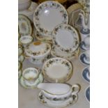 A Royal Doulton Larchmont pattern dinner service for six comprising of dinner plates ; side plates ;