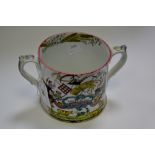 A 19th century Staffordshire twin handled mug, printed Trust in God,