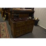 A mid twentieth century oak court cupboard