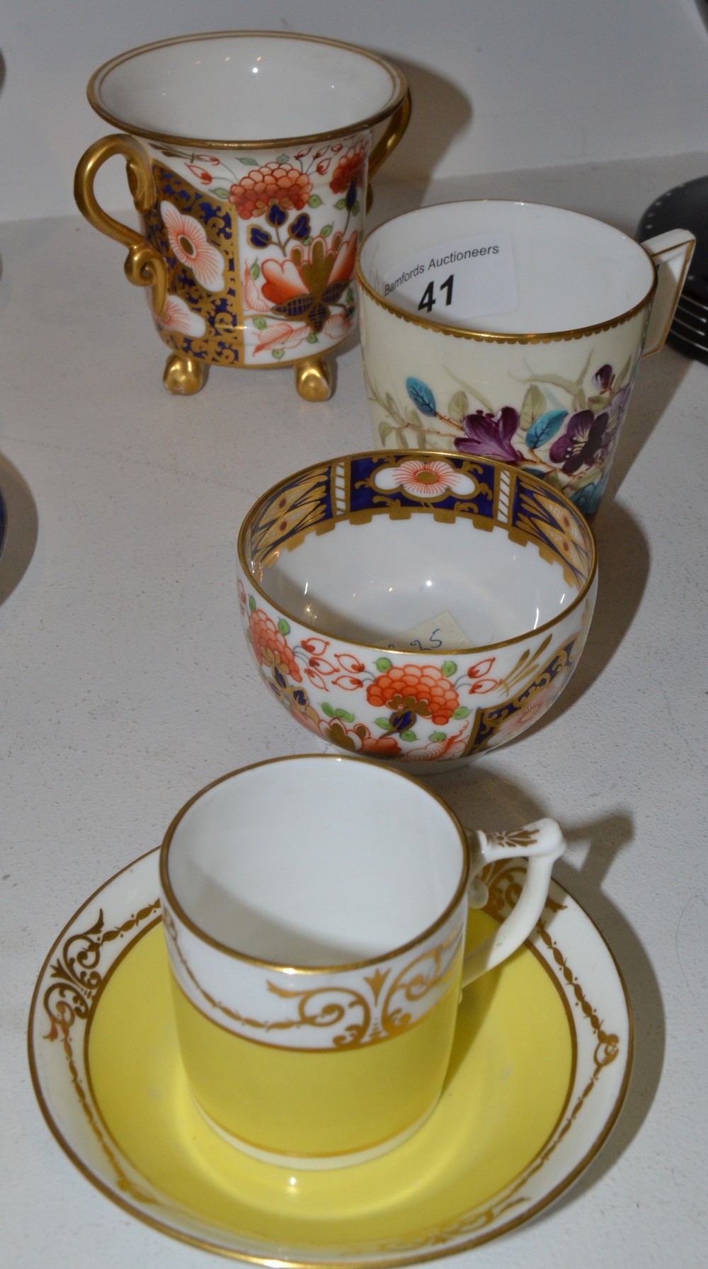 A Sampson Hancock twin handle vase ;  a yellow and gilt coffee can and saucer;