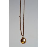 A 9ct gold Albert chain and locket,