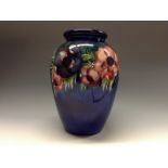 A large Moorcroft Anemone pattern bowed cylindrical vase,